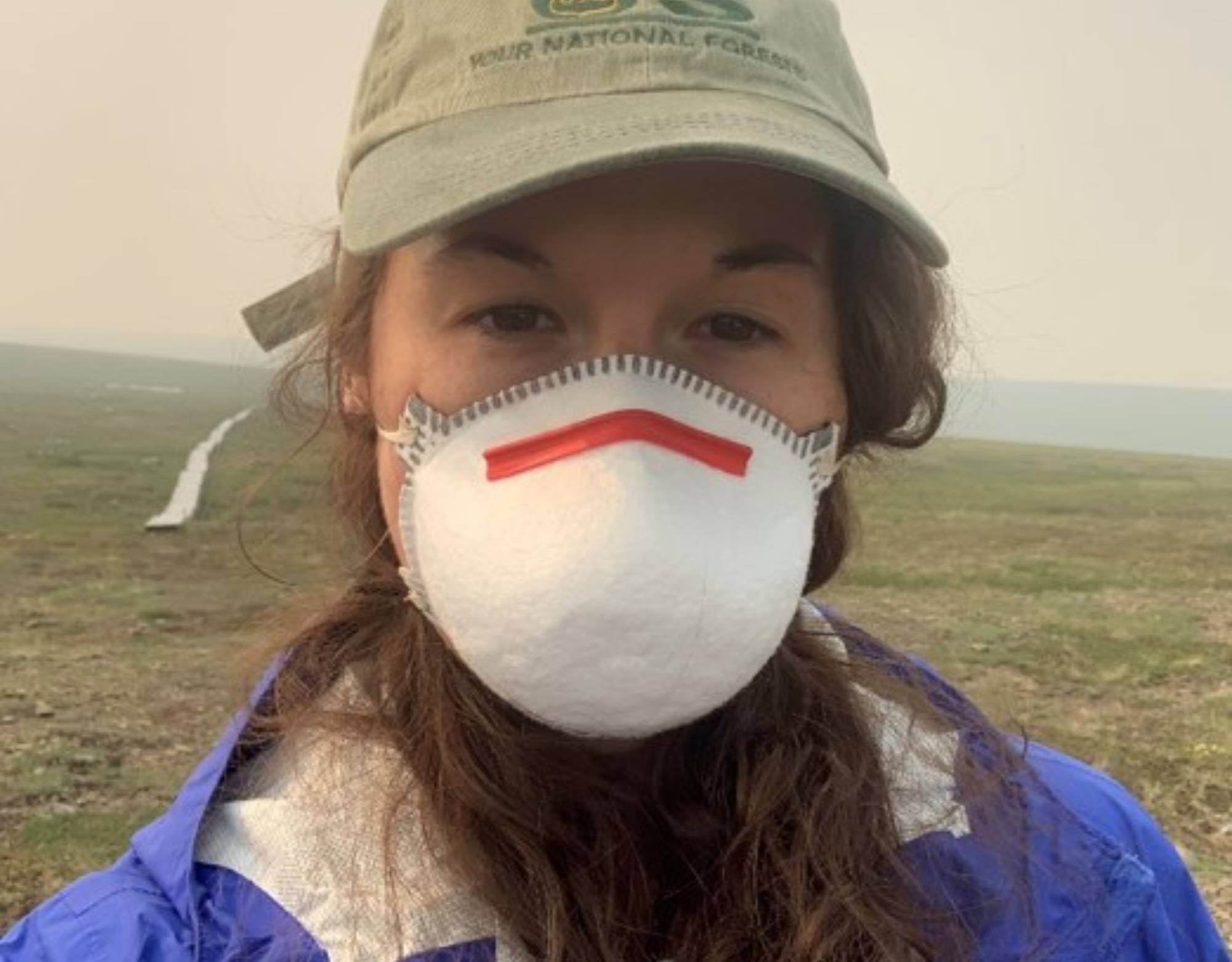 Sarah protects herself from wildfire smoke